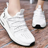 Witte Sneakair III Hardloopschoenen met gemakkelijk in te glijden ontwerp en elastische schoenveters voor een gemakkelijke pasvorm.